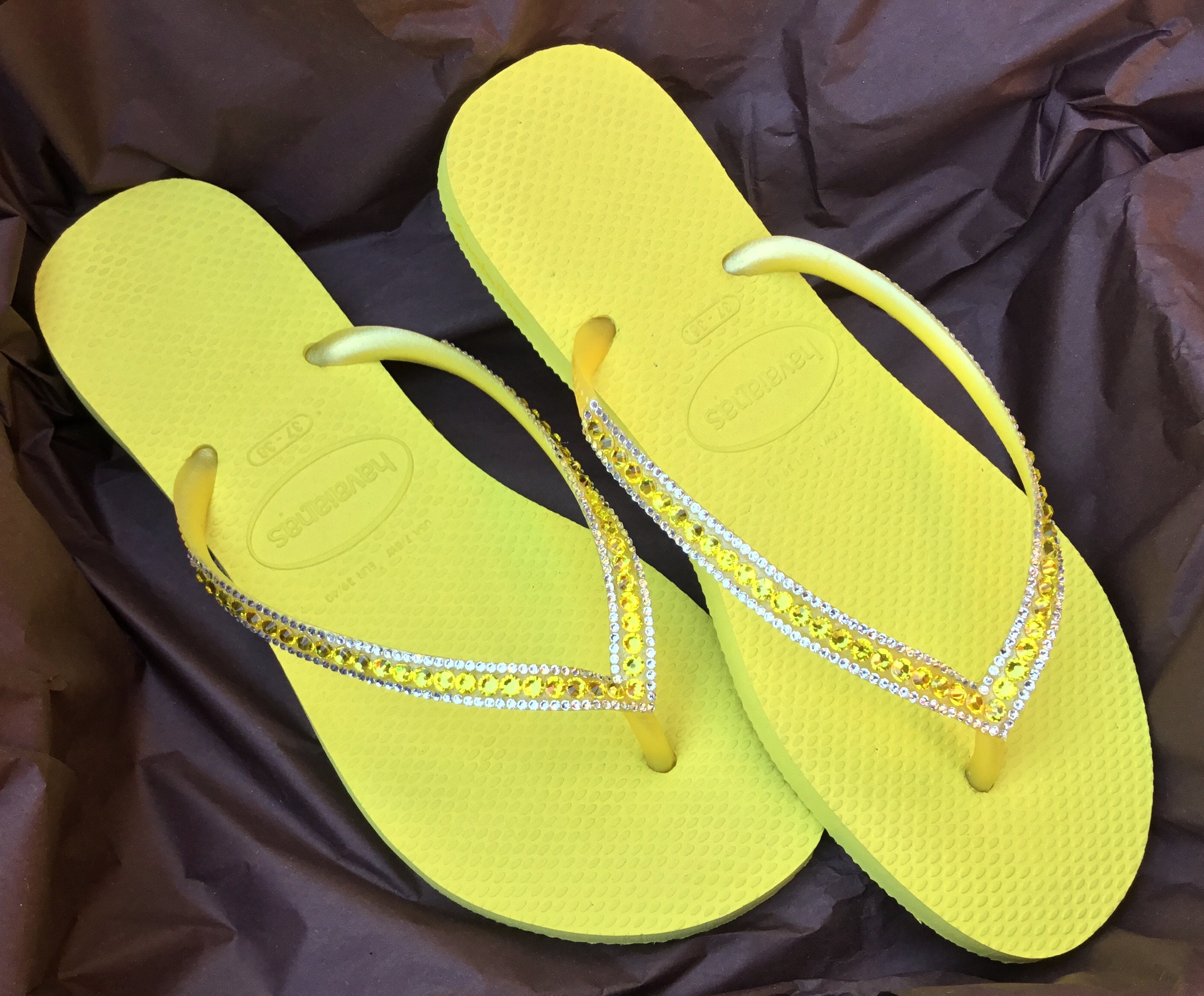 pale yellow flip flops