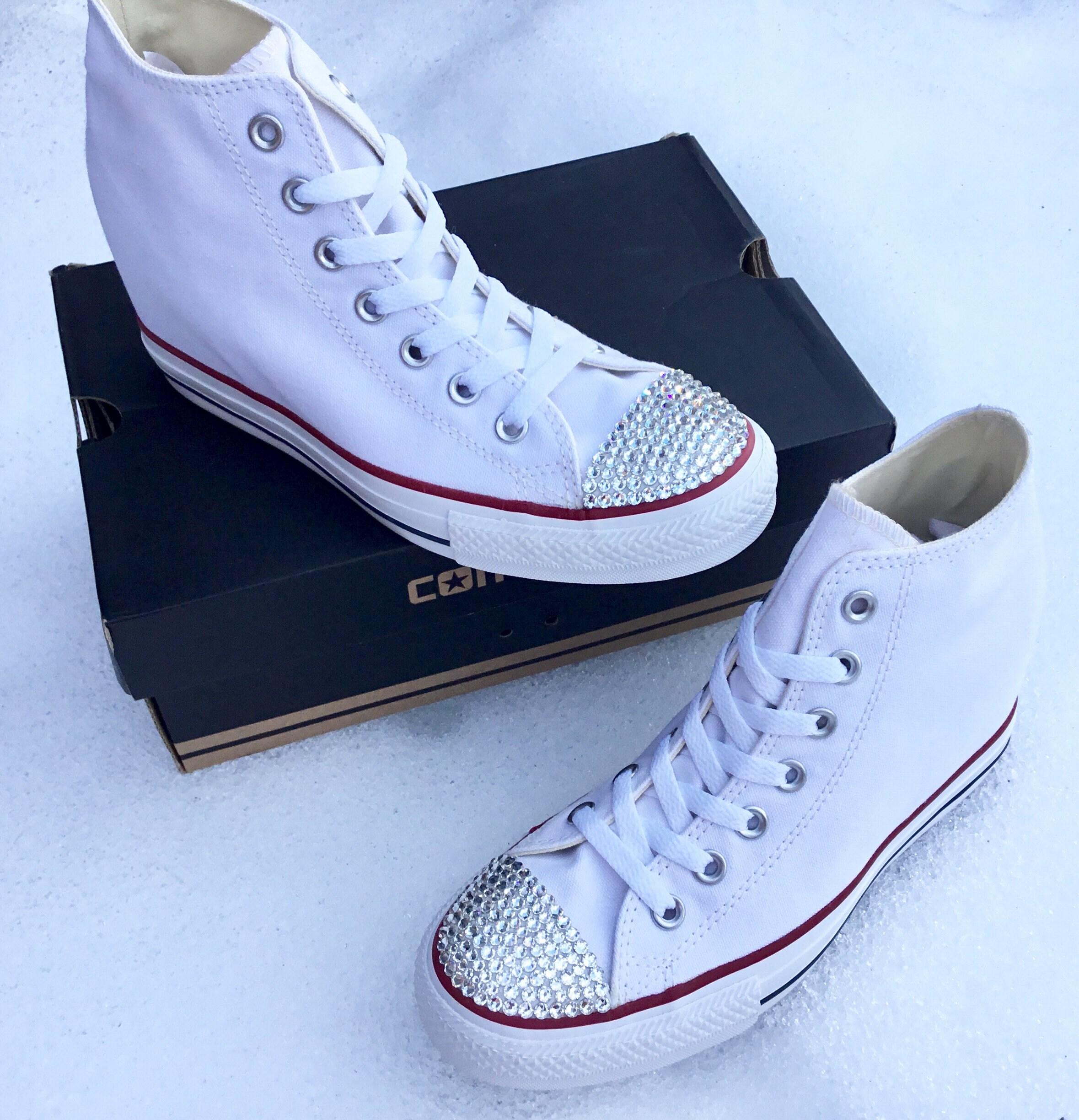converse ladies white pumps