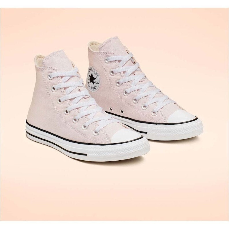 pink high top converse youth