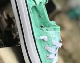 green converse shoreline