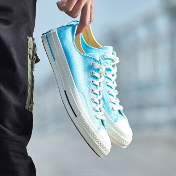 turquoise low top converse