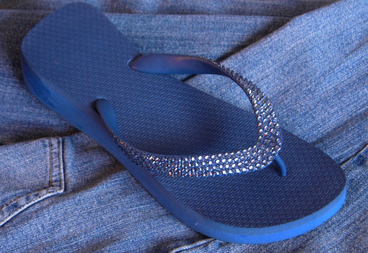 navy blue flip flops with bling