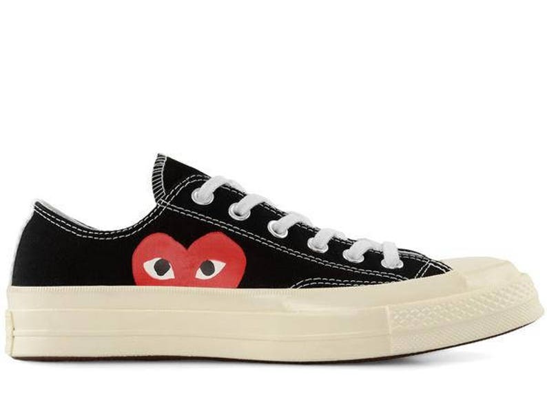 black converse with heart