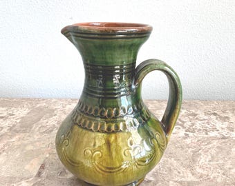 Vintage olive-green glossy glazed ceramic pitcher