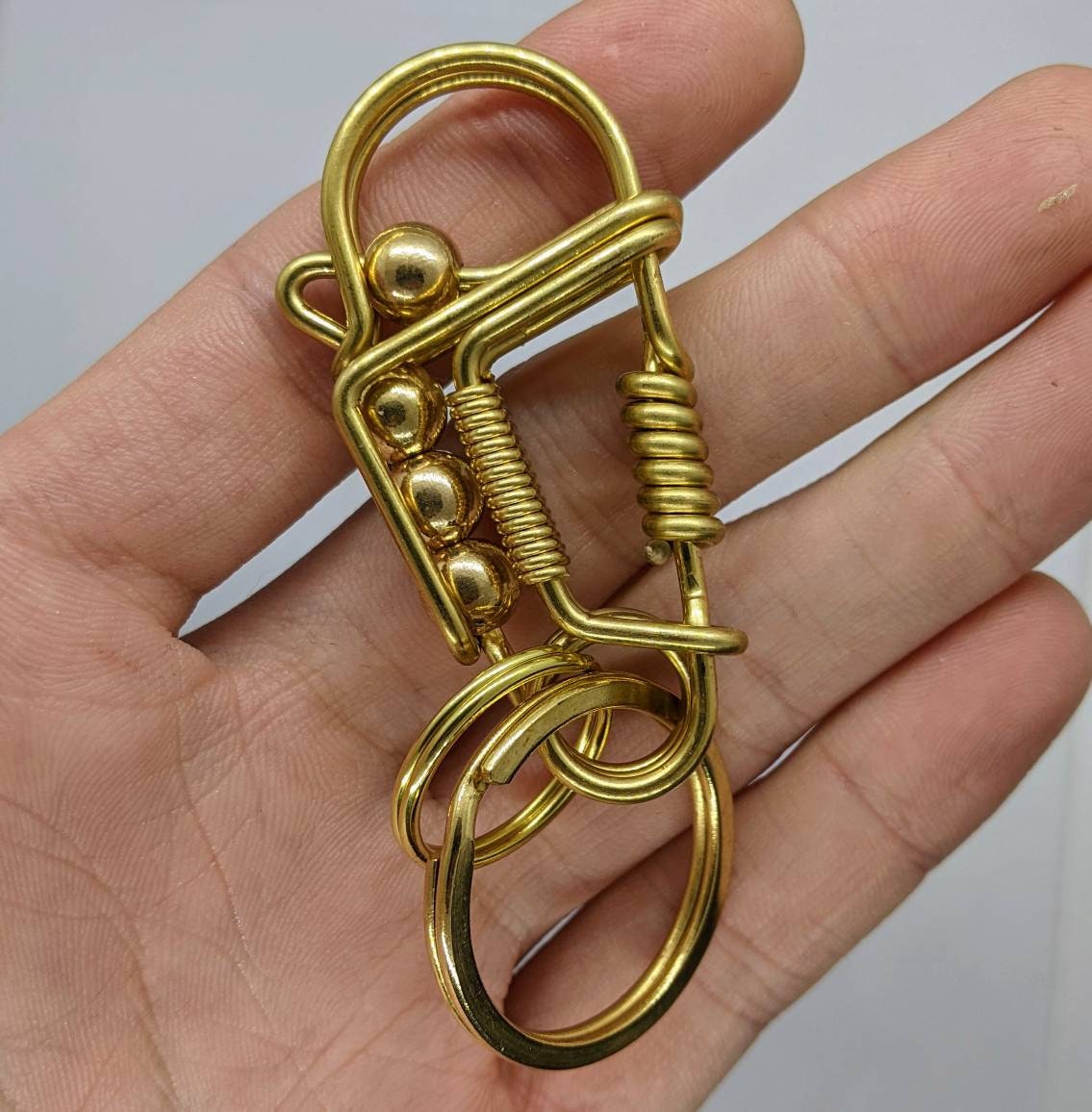 Leather wrap brass carabiner clip with whistle and key cover