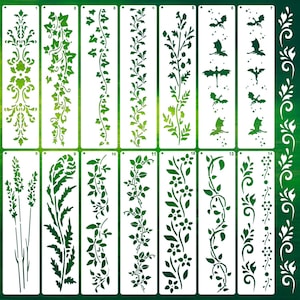 May include: A set of fourteen rectangular white stencils featuring various green patterns including ivy vines, floral arrangements, ferns, lavender stalks, and silhouettes of flying dragons, each numbered from one to fourteen in the top corner.
