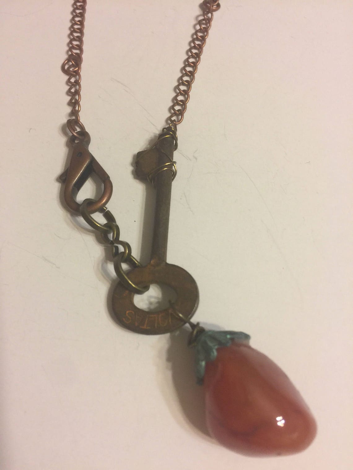 Natural Auburn Stone Pendant Necklace With Vintage Skeleton Key and