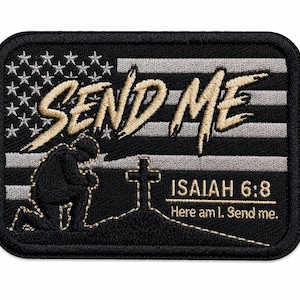 May include: A rectangular embroidered patch featuring a black and grey American flag background. The text SEND ME is stitched in gold thread above a silhouette of a kneeling soldier before a cross. The text ISAIAH 6:8 Here am I. Send me. is below.