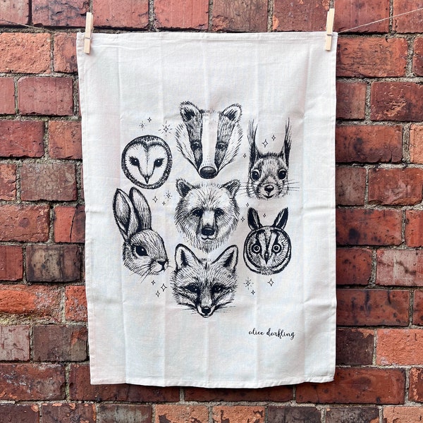 Woodland animals tea towel 100% natural cotton screen printed in the UK with an illustration of forest wildlife creatures by Alice Darkling