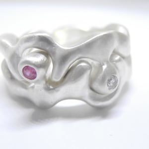 Anillo Tu y Yo , plata esterlina con diamante y rubi