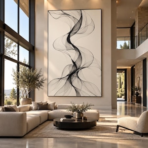 May include: A large rectangular wall art piece featuring abstract black flowing lines on a cream background, framed in a thin black border. The artwork displays a vertical, wave-like pattern that creates a sense of movement and depth.