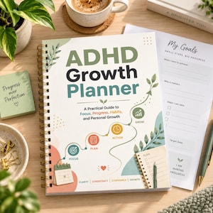 May include: A spiral-bound ADHD Growth Planner with a white cover featuring green and black text, a winding path graphic with icons for focus, plan, action, and growth, and the subtitle A Practical Guide to Focus, Progress, Habits, and Personal Growth.