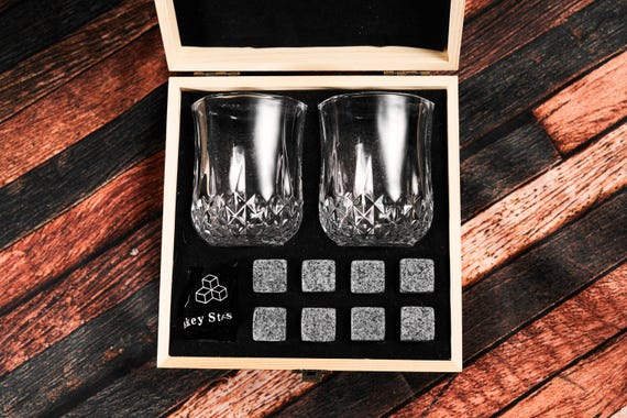 A fully engraved whiskey glass set presented in a crafted wooden box — the kind of heirloom-feeling gift that looks like it took real thought and skill to put together.