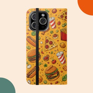 May include: A yellow phone case featuring a repeating pattern of fast food items including hamburgers, hot dogs, pizza slices, french fries, and soda cups. A black elastic band runs vertically across the center of the case, covering the camera area.