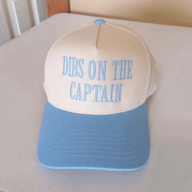 Dibs on the Captain hat in blue and natural canvas embroidered in large lettering