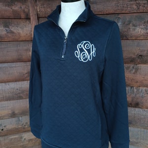 Navy quilted quarter zip with monogram