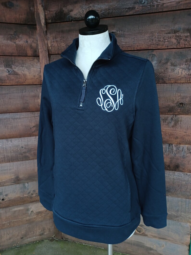 Navy quilted quarter zip with monogram