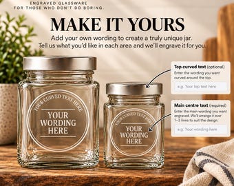 May include: Two clear glass jars with silver metal lids, featuring custom engraving areas. The text reads Indigo & Scribe, Engraved Glassware, Make It Yours, Top curved text, and Main centre text. The jars have circular etched designs.