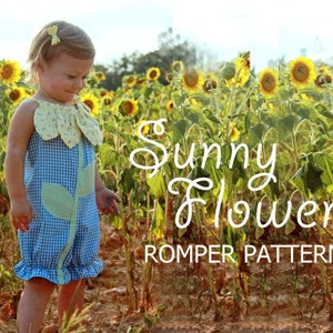 May include: A little girl wearing a blue and white gingham romper with a green flower applique. The romper has a white ruffled collar and a yellow bow in her hair. The girl is standing in a field of sunflowers. The text "Sunny Flower Romper Pattern" is superimposed on the image.