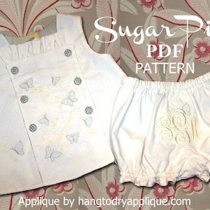 Könnte beinhalten: Ein weißes Baby-Outfit mit einem weißen, gestickten Schmetterlingsmuster. Das Outfit besteht aus einem ärmellosen Oberteil mit Knopfleiste und einer Hose. Der Text "Sugar Pie PDF PATTERN" ist oben im Bild zu sehen.