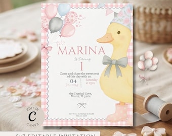 May include: A birthday invitation card featuring a yellow duckling wearing a floral party hat and pink rain boots. The card has a pink gingham border, watercolour balloons, and text reading MARINA, Is Turning 1, 04 January, Saturday at 2pm.