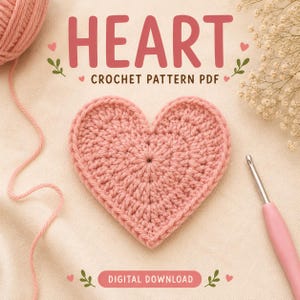 May include: A digital download crochet pattern PDF titled HEART with a pink crocheted heart, a ball of pink yarn, and a pink crochet hook. The text reads HEART CROCHET PATTERN PDF and DIGITAL DOWNLOAD, decorated with small pink hearts and green leaves.