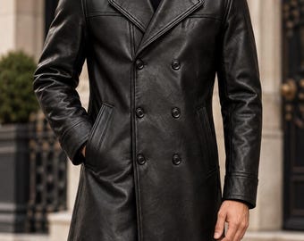 May include: A black double-breasted leather coat featuring a wide notched collar, long sleeves with cuffs, and two vertical side pockets. The coat is worn over a black turtleneck sweater and is buttoned with six black buttons down the front.