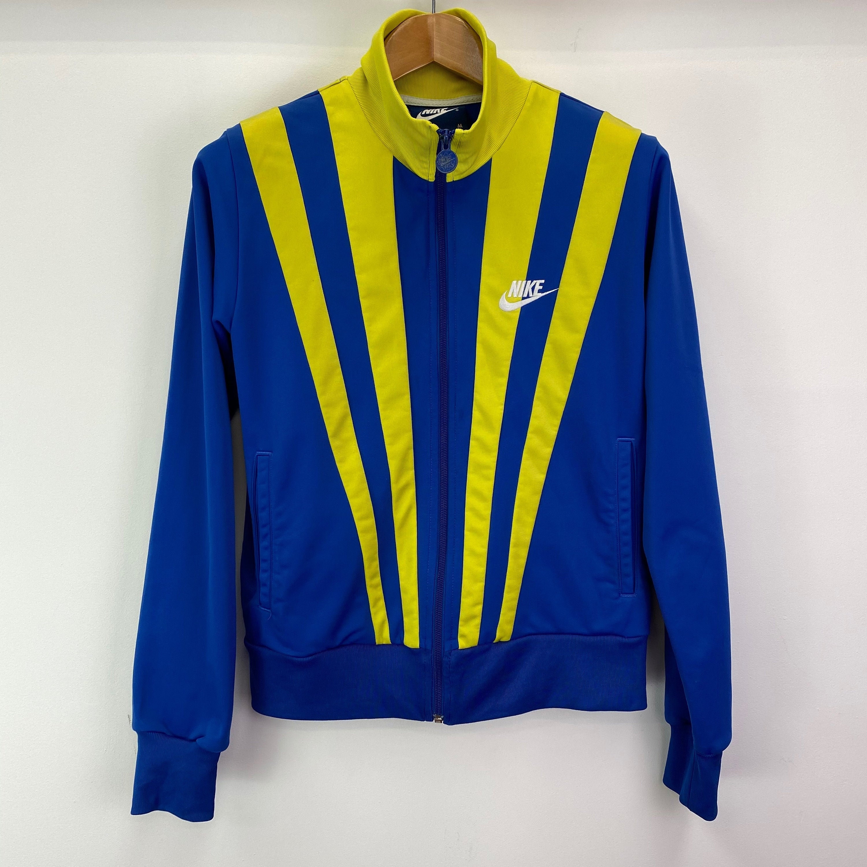 nike zip track top