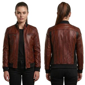 Giacca da donna in pelle nera e marrone, stile Cafe Racer/Moto, cappotto in pelle a contrasto con blocchi di colore, gomiti trapuntati e polsini a coste.