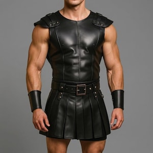 May include: A black sleeveless vest with shoulder epaulets and a matching pleated skirt featuring a wide belt with a metal buckle. The set includes two black wrist cuffs, all constructed from a smooth material with visible vertical seams.