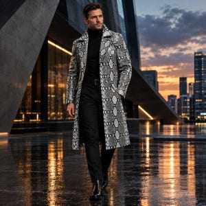 May include: A long coat featuring a black and white snakeskin pattern, worn over a black turtleneck jumper, black trousers with a belt, and black boots. The coat has a structured collar, long sleeves, and a knee-length hemline with a button closure.
