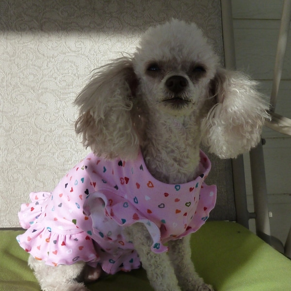 Dog Clothes, An Adorable Puppy Dress, Medium Size in Pink with Pretty Little Hearts with a Bright Red Bow.