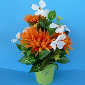 Easter Flower Arrangement, Floral Arrangement, Silk Flowers of Yellow and Bright Orange in a  Bright Lime Green Pot.