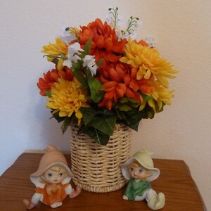 Floral Arrangement: Yellow & Orange Mums in Tan Basket