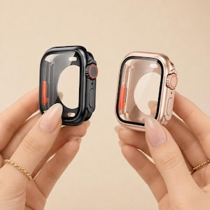 May include: Two protective watch cases with integrated screen protectors. One case is matte black with a red-accented digital crown, and the other is metallic rose gold with a matching rose gold digital crown. Both feature precise cutouts.
