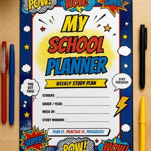 May include: A rectangular school planner with a comic book theme featuring blue borders, yellow stars, and speech bubbles with text including POW!, WOW!, SUPER!, MY SCHOOL PLANNER, WEEKLY STUDY PLAN, YOU GOT THIS!, STAY FOCUSED!, and PLAN IT. PRACTICE IT. PROGRESS!