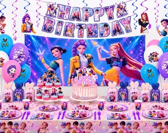May include: A birthday party decoration set featuring a large banner with the text HAPPY BIRTHDAY, a backdrop with three animated characters, balloons in blue, pink, and purple, a cake with a topper, and matching plates, cups, and napkins.