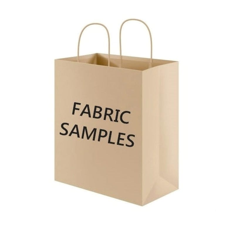 May include: A brown paper shopping bag with handles. The bag has the text "FABRIC SAMPLES" printed on the front.