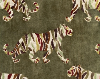 May include: A fabric featuring a repeating pattern of tigers in a walking pose. The tigers are cream-colored with stripes in shades of dark brown, deep red, and light green, set against a solid, dark olive green background.