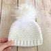 see more listings in the Faux fur pom pom hats section