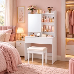May include: A white vanity table with a large rectangular mirror, a single drawer, and an attached hutch featuring three open shelves. The vanity includes a matching white stool with a beige upholstered seat, designed for organising cosmetics and beauty products.
