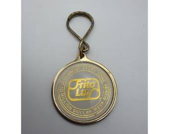 Vintage 1984 Frito Lay 10 miljoner dollar vecka Southwest Sales Zone nyckelring