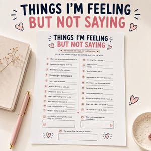 May include: A white paper worksheet titled THINGS I'M FEELING BUT NOT SAYING, featuring twenty-four numbered prompts for self-reflection. The text is in black and pink, decorated with small pink heart illustrations and lines for writing responses.