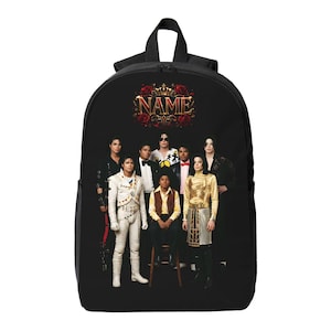 May include: A black backpack featuring a graphic print of Michael Jackson in various iconic outfits and poses. Above the figures, the word NAME is displayed in gold lettering, framed by a decorative red rose and gold crown emblem on a black background.