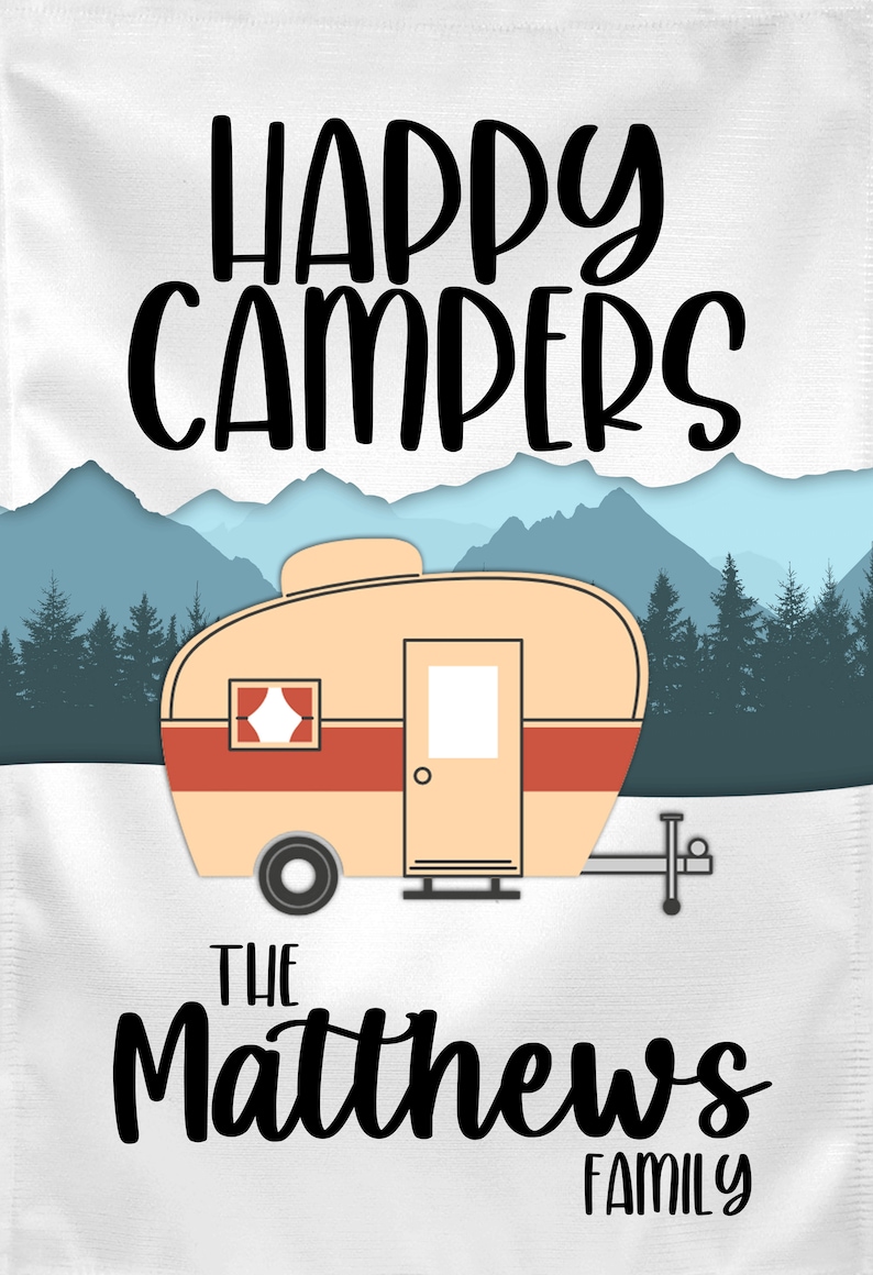 May include: A white canvas print with the text "Happy Campers" in black. Below the text is a cartoon image of a vintage camper in front of a mountain range. The text "The Matthews Family" is below the camper.