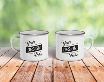May include: Two white enamel mugs with silver rims. The mugs have black text that reads "Your DESIGN Here" on each mug.