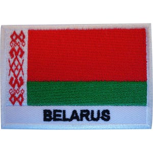 May include: A rectangular embroidered patch featuring the flag of Belarus with a red horizontal band above a green horizontal band and a white vertical strip on the left side with a red ornamental pattern. The word BELARUS is in black text.
