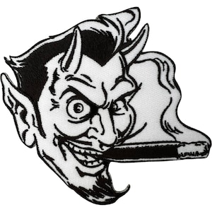 May include: An embroidered patch featuring a black and white graphic of a devil character with horns, a pointed goatee, and a wide grin. The character is holding a lit cigar in its mouth, with a plume of white smoke trailing behind it.