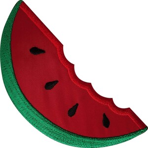 May include: A watermelon slice shaped embroidered patch featuring a vibrant red center with four black teardrop-shaped seeds. The curved outer edge is bordered by a thick green rind, and the inner edge has a scalloped bite mark design.