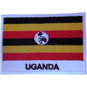 May include: A rectangular embroidered patch featuring the flag of Uganda with horizontal stripes of black, yellow, and red. A white circle in the center contains a grey crowned crane. The word UGANDA is embroidered in black at the bottom.